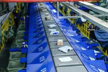 從1.7億到118億，解碼“中國(guó)快遞第一城”