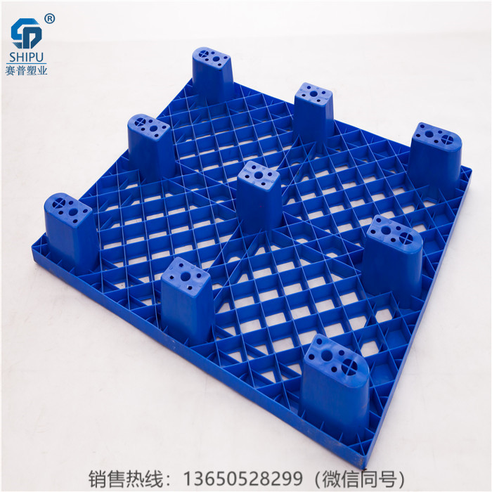 供應(yīng)重慶潼南九腳塑料托盤 1.2米*1米網(wǎng)格塑料托盤廠家直銷