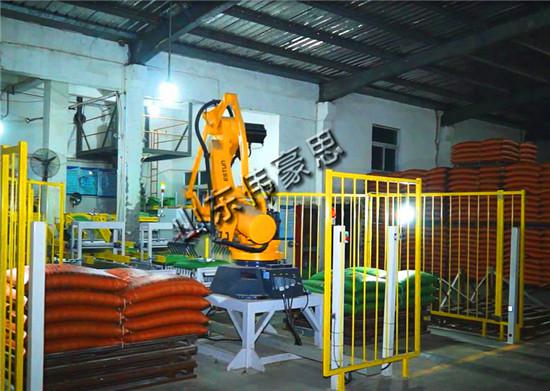 豆粕飼料全自動(dòng)碼垛機(jī) 袋料機(jī)器人碼垛解決方案